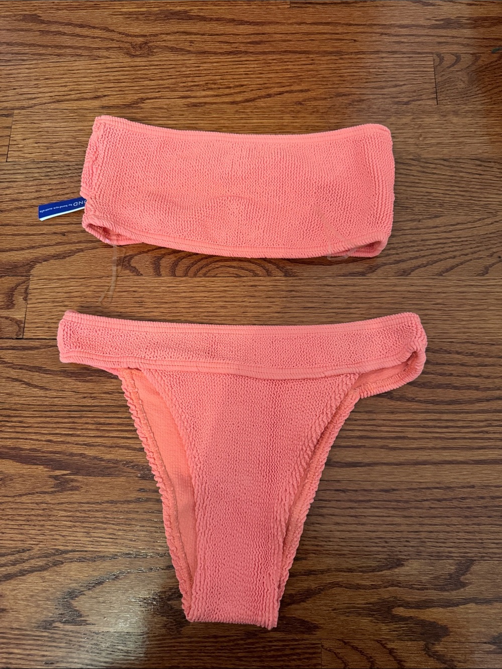Bond eye orange bikini set strapless has been worn. One size. Cut out in back